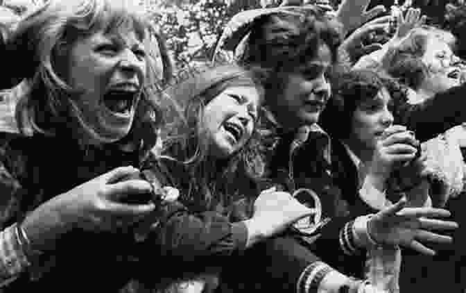 A Group Of Teenage Girls Screaming At A Boy Band Concert. Article: En Vogue A Throwback To The 90s (2009)